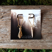 Load image into Gallery viewer, Brass Hand and Dagger Dangle Earrings