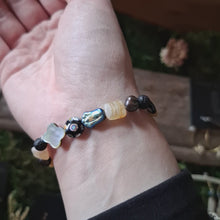 Load and play video in Gallery viewer, Oil Slick Mismatched Bead Bracelet