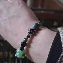 Load and play video in Gallery viewer, Black Mushroom Mismatched Bead Bracelet