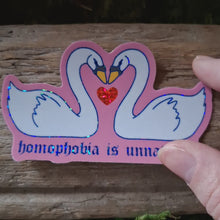 Load and play video in Gallery viewer, "Homophobia is Unnatural" Glitter Sticker