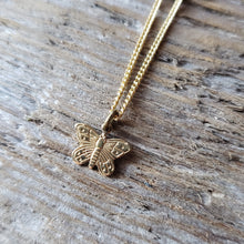 Load image into Gallery viewer, Tiny Brass Butterfly Pendant