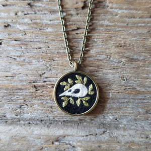 Tiny Embroidered Bird Skull Necklace