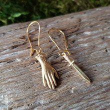 Load image into Gallery viewer, Brass Hand and Dagger Dangle Earrings
