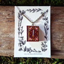 Load image into Gallery viewer, Handmade Swords and Roses Storybook Pendant
