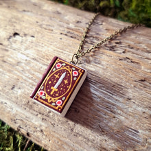 Load image into Gallery viewer, Handmade Swords and Roses Storybook Pendant
