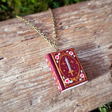 Load image into Gallery viewer, Handmade Swords and Roses Storybook Pendant
