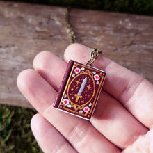 Load image into Gallery viewer, Handmade Swords and Roses Storybook Pendant
