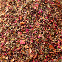 Load image into Gallery viewer, Close-up of crumbled dried herbs and petals in a heaping pile
