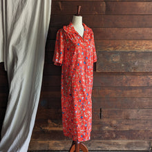 Load image into Gallery viewer, 60/70s Vintage Orange Floral Zip Up House Dress

