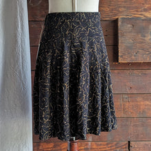 Load image into Gallery viewer, 90s Vintage Flared Black Rayon Mini Skirt
