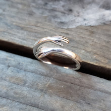 Load image into Gallery viewer, Adjustable Sterling Silver Hugging Hands Ring
